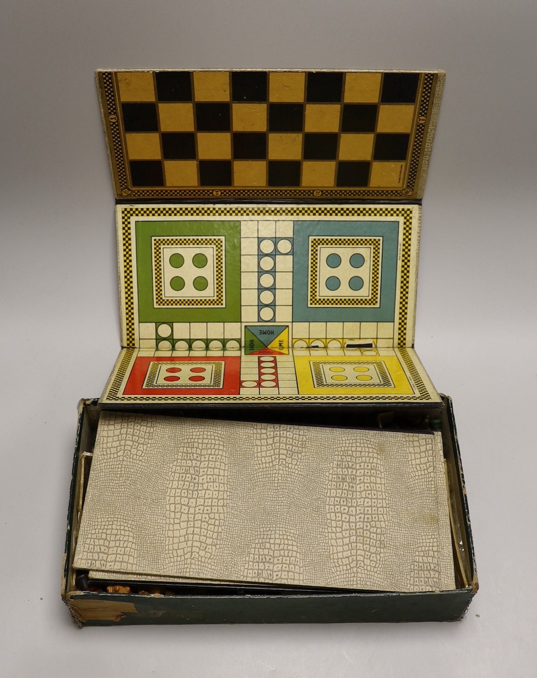 A Staunton pattern boxwood and ebony chess set, kings 7.5cm high and a boxed games compendium